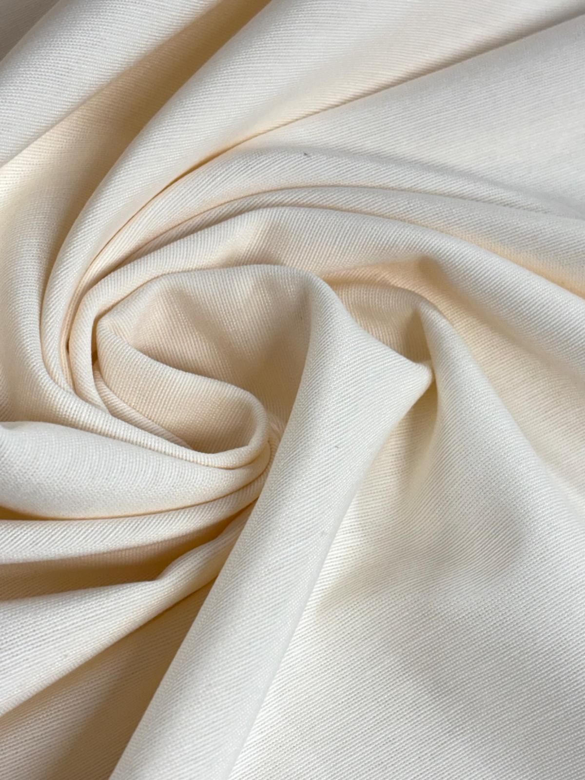 Loneta lisa tintada crudo