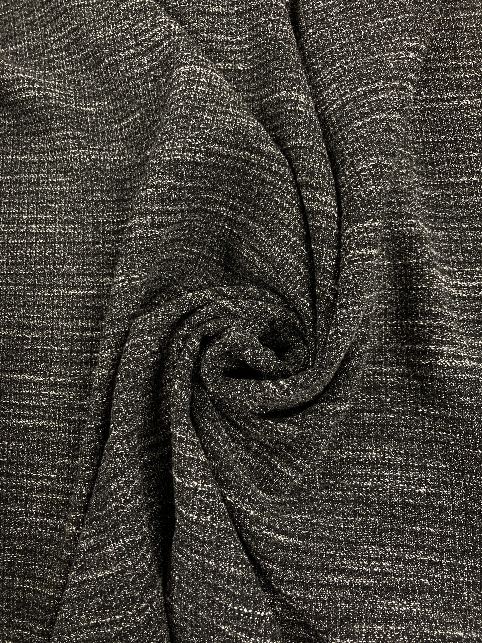 Tejido jaspeado gris