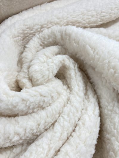 Borreguito sherpa doble cara crudo